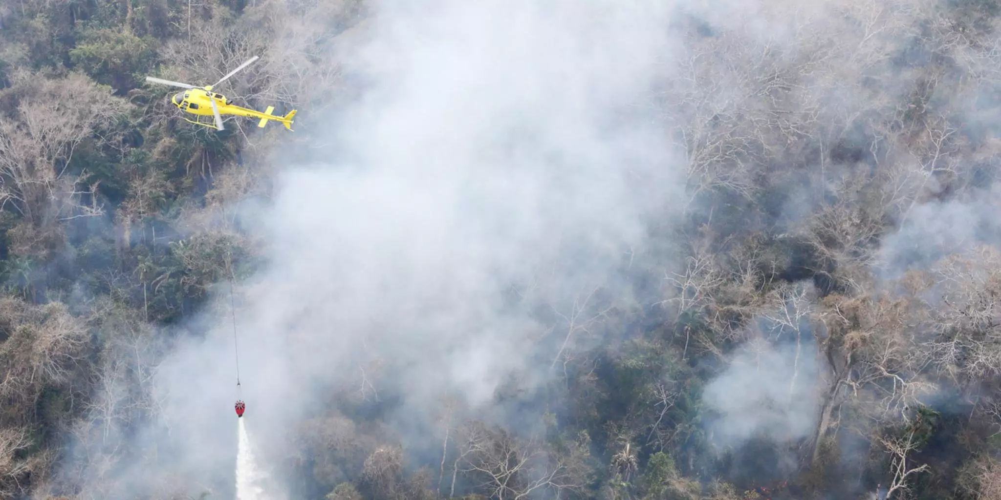 Helicopters battle the blaze